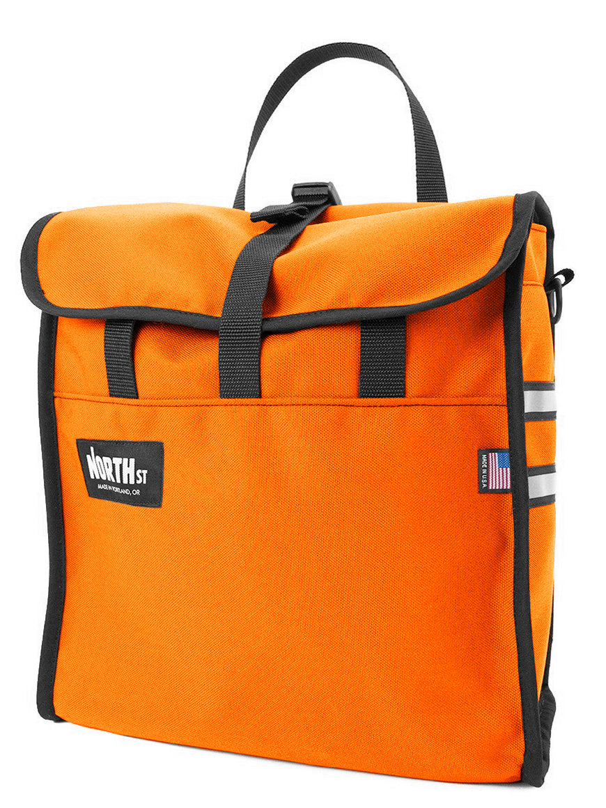 Front view of grocery pannier in orange - North St. Bags