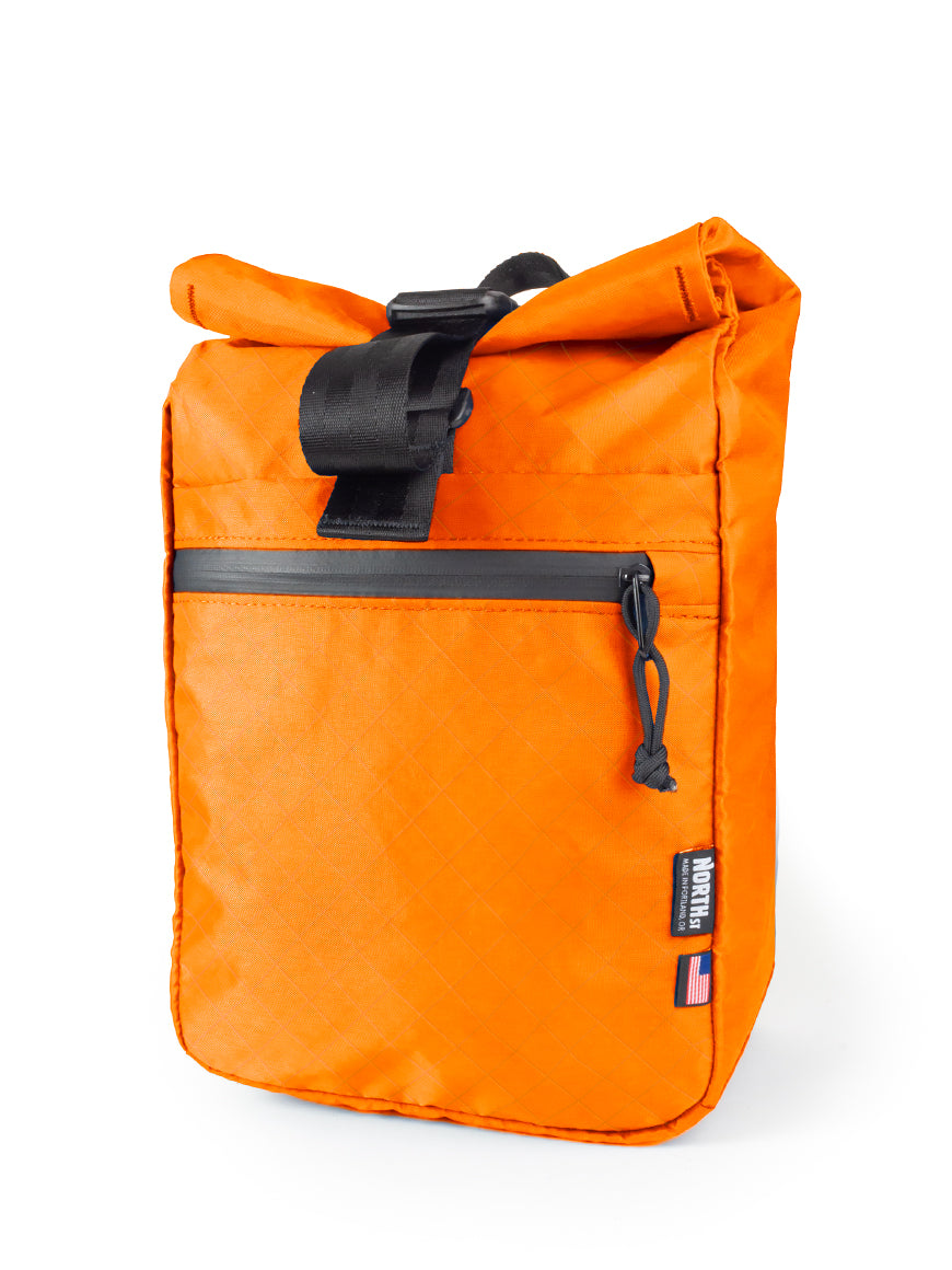 front view of commuter micro pannier in blaze orange