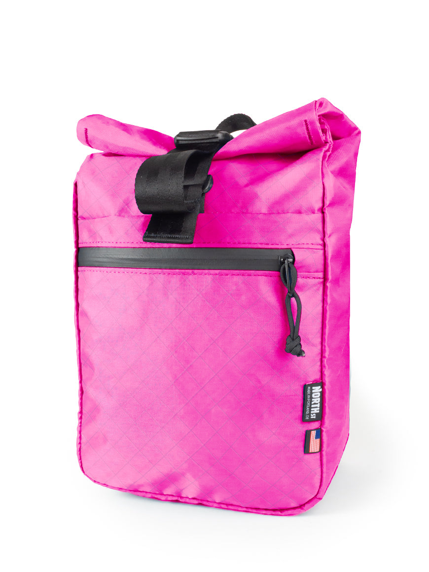 front view of commuter micro pannier in hot pink