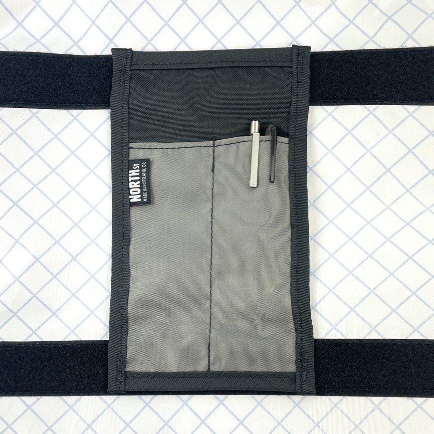 5in Sleeve Pocket installed in liner with pens. - North St Bags