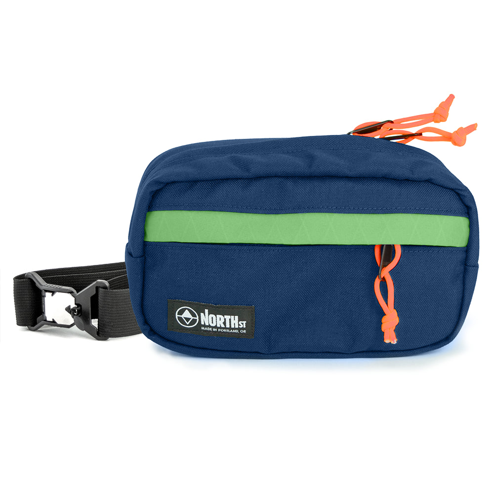 pioneer 9 hip pack in midnight with green accent and north st label