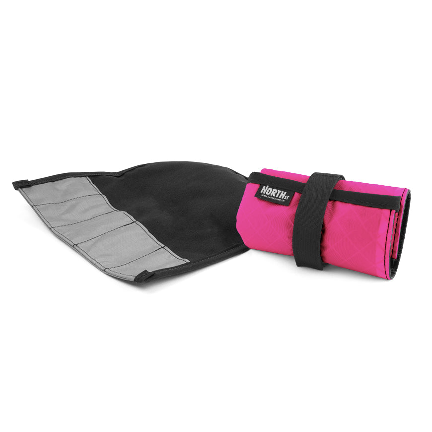 North St tool in pink roll shown open and flat next to one rolled up