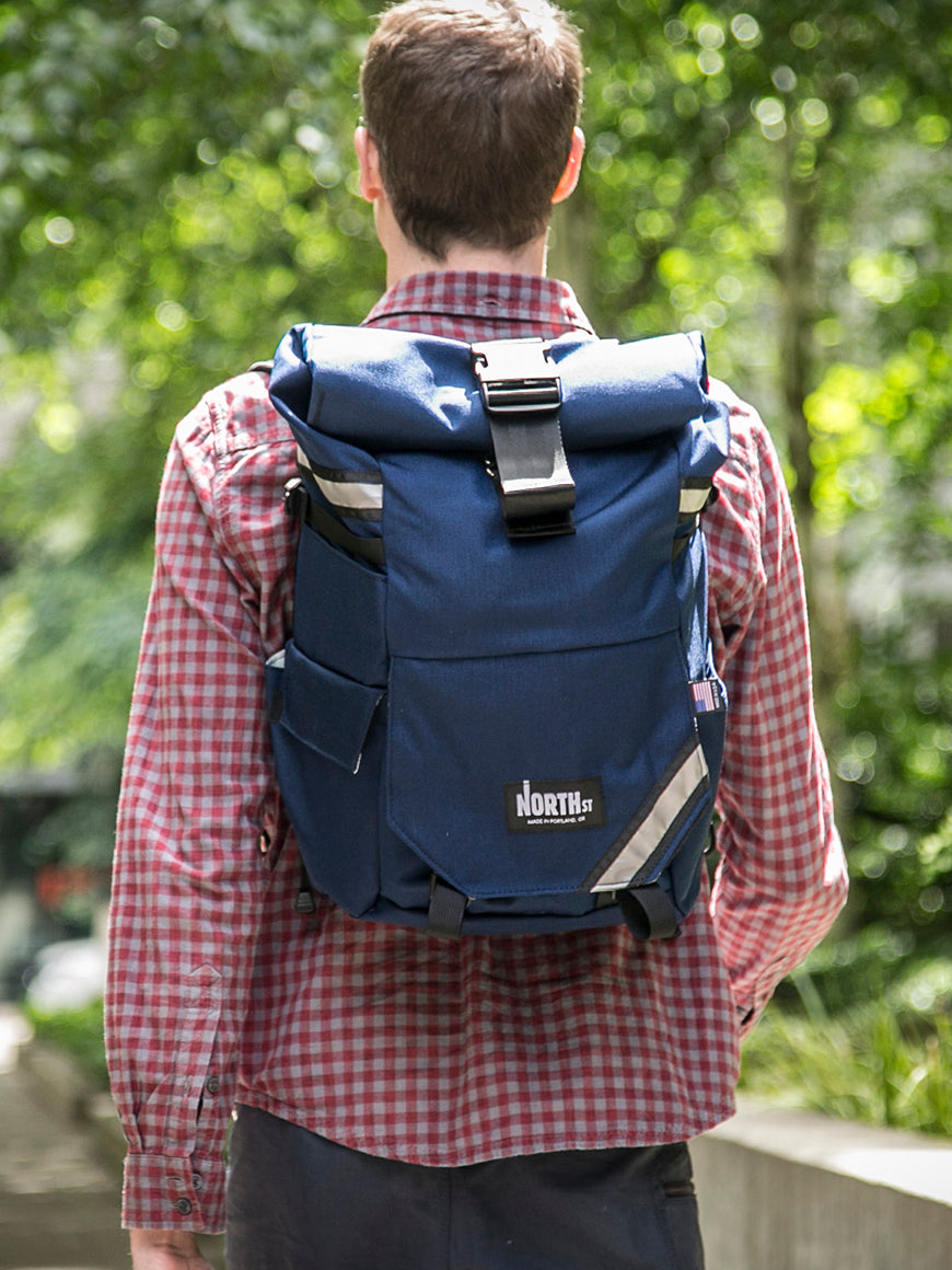 Man walking while wearing Woodward bag as a backpack - North St Bags all-groups