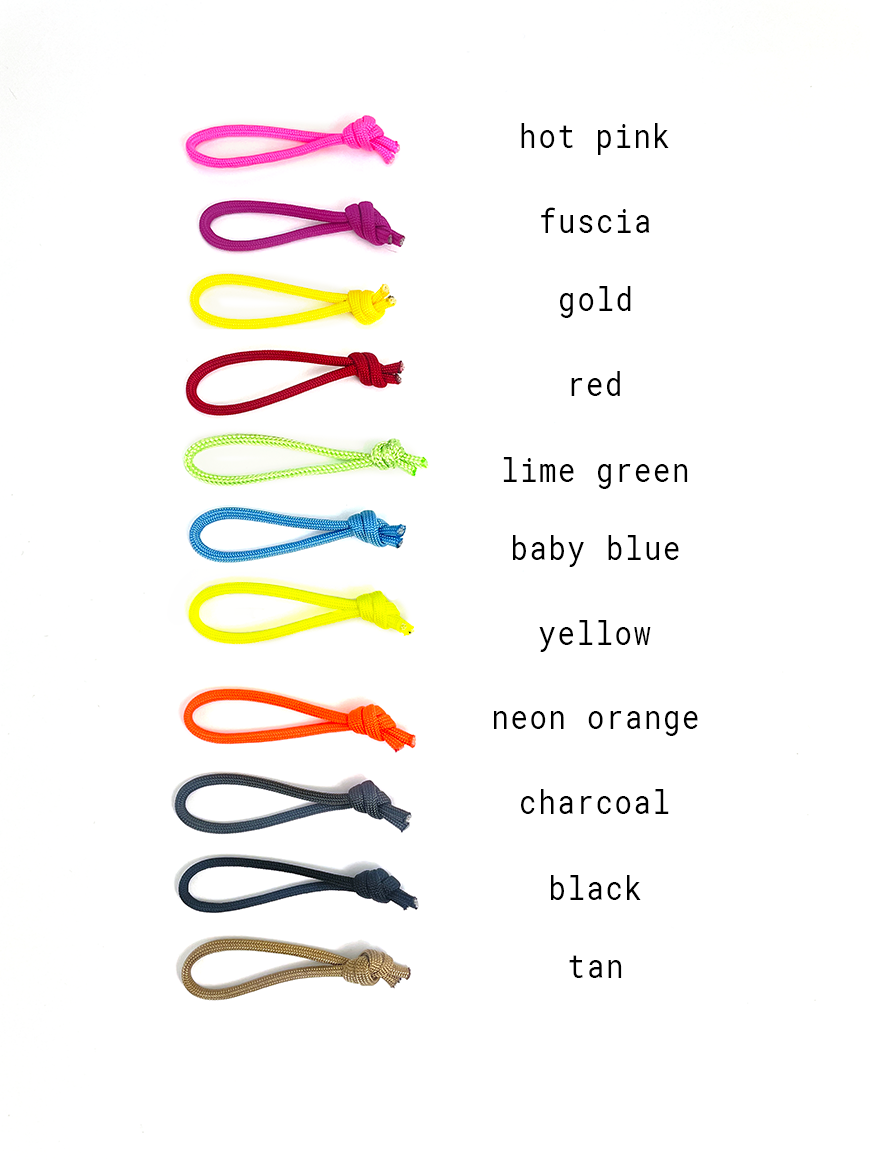 An array of different color replacement cords for zipper pulls - North St. Bags