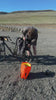 Bikepacking adventure showing 2 cyclists loading bags for a gravel ride.