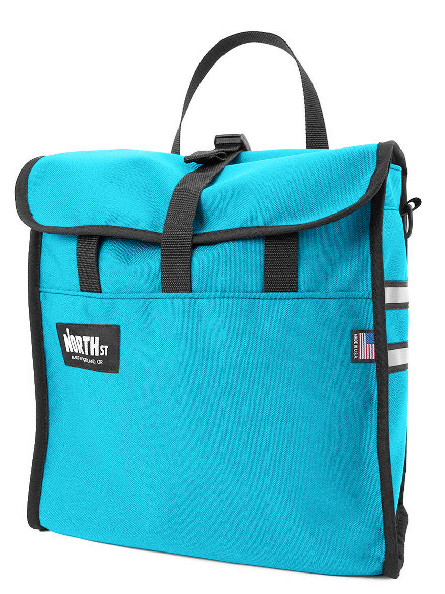 Front view of grocery pannier in teal - North St. Bags