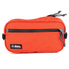 front view of sling pack by North St in orange