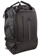 Back view of a black travel backpack showing stow-able backpack straps and carry handles on a white background. 